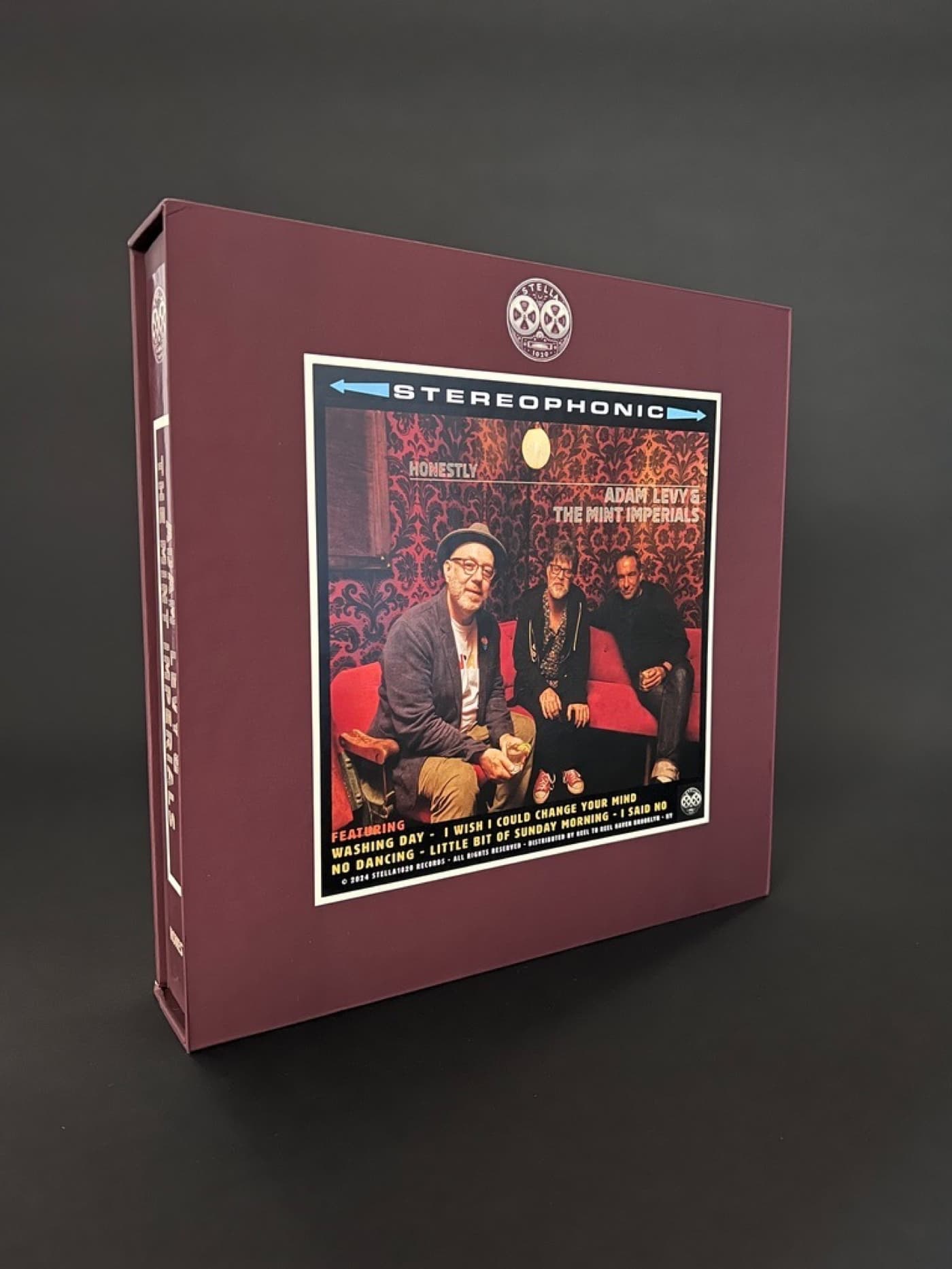 Front view of Adam Levy album box featuring stereophonic banner and band photo